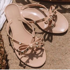 Nude studded jelly sandals